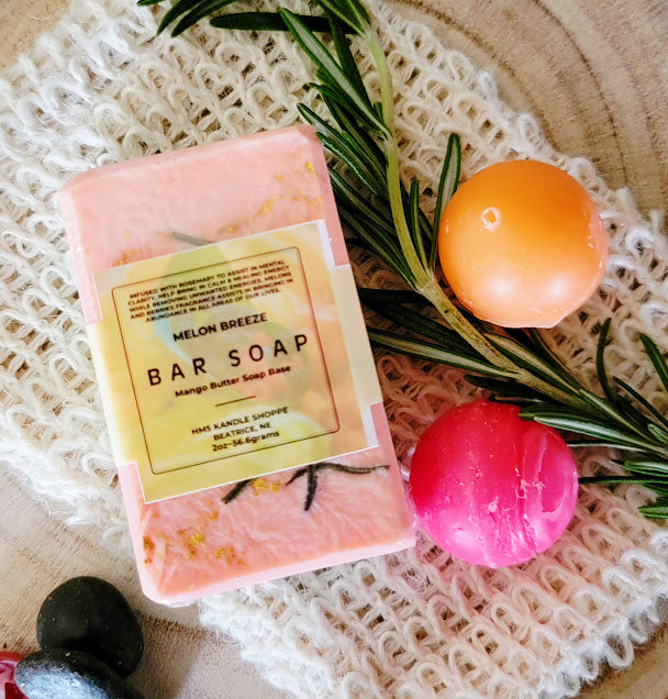Spiritual Bar Soap Melon Breeze&nbsp;

2oz-56.6grams

Remember watermelon fruit bowls??😉

This soap was created with Intention! The beautiful colors of Green, Red &amp; Orange with a few swirls of Gold. Infused with Rosemary leaves.&nbsp;This kandle is scented with an amazing fragrance oil of Melon Breeze. It just takes you right into a beautiful Spring or Summer Day! The combination of the colors, melon fragrance and rosemary all work together to assist bringing in abundance in all areas of our lives. Upl