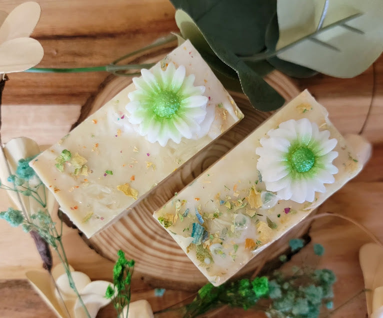 Spiritual Bar Soap-Wildflowers
5oz-141.7grams


Goat Milk M&amp;P Soap Base with rose petal &amp; mica for color. Dried rose and flower pieces added on top. Daisy Soap embed on top. Gold shimmer.


These bars are absolutely beautiful! This chunky size bar is full of self love. Beauty and resilience. Reminding us to see our own goodness in our everyday!


A refreshing fragrance of Wildflowers and champagne! Celebrate you!&nbsp;
A whimsical fragrance with a fun design.





*Soap S