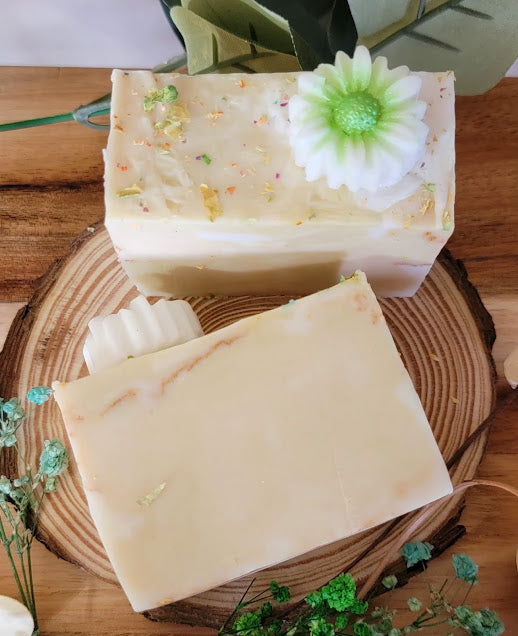 Spiritual Bar Soap-Wildflowers
5oz-141.7grams


Goat Milk M&amp;P Soap Base with rose petal &amp; mica for color. Dried rose and flower pieces added on top. Daisy Soap embed on top. Gold shimmer.


These bars are absolutely beautiful! This chunky size bar is full of self love. Beauty and resilience. Reminding us to see our own goodness in our everyday!


A refreshing fragrance of Wildflowers and champagne! Celebrate you!&nbsp;
A whimsical fragrance with a fun design.





*Soa