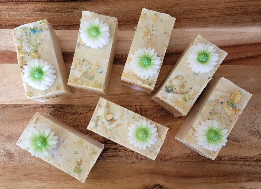 Spiritual Bar Soap-Wildflowers
5oz-141.7grams


Goat Milk M&amp;P Soap Base with rose petal &amp; mica for color. Dried rose and flower pieces added on top. Daisy Soap embed on top. Gold shimmer.


These bars are absolutely beautiful! This chunky size bar is full of self love. Beauty and resilience. Reminding us to see our own goodness in our everyday!


A refreshing fragrance of Wildflowers and champagne! Celebrate you!&nbsp;
A whimsical fragrance with a fun design.





*Soap S