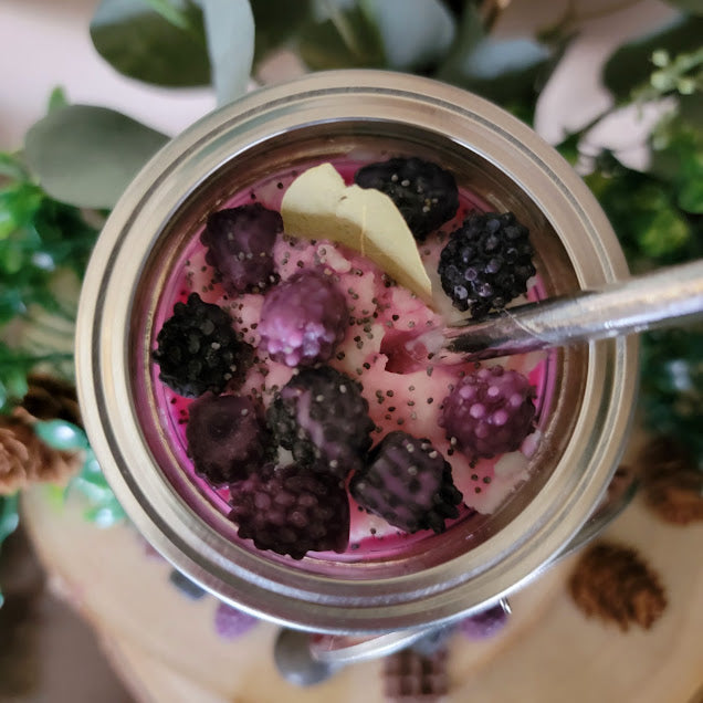 Blackberry Fizz Smoothie-Spiritual Wickless Kandle

9oz-255grams 100% Soy Wax&nbsp;

A variety of flavors to choose from! Even though they look delicious... please do not eat😉 Each Smoothie is infused with a special blend of herbs paired with the fruit and fragrances.&nbsp;

Infused with Blackberries, Bay leaves, and Poppy Seeds. The combination of blackberries, bay leaves and poppy seeds assist in clearing energy, protection, healing, abundance, money, grounding. Assists with removing unwanted energies.&n