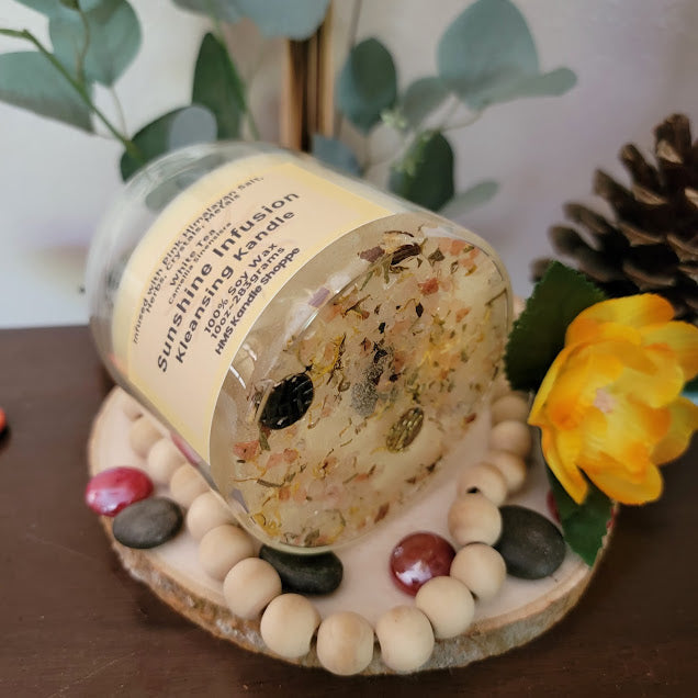 Sunshine Infusion Kleansing Kandle ~ Spiritual

10oz Glass Jar with Ball Cork Lid

100% Soy Wax

Fragrance~White Tea

Kleansing Intention kandles are made of 100% soy wax with a clean and refreshing, light-sweet floral fragrance. This kandle is infused with salts, herbs, crystals and metals.

The dried herbs, salt, crystals and coins are uniquely placed in the bottom of the jar set in a clear bubbly gel wax. The cotton wick is intentionally placed on top of the gel wax so that all of the natural elements ar