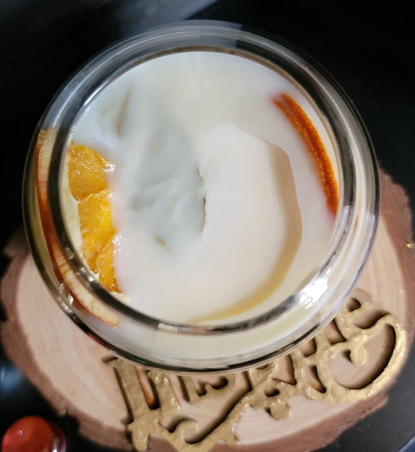 Orange Ginger Wickless Kandle-Spiritual

6oz~170grams&nbsp;

Sunshine Orange Fragrance

100% Soy Wax Wickless Kandle

The fresh Sunshine Orange fragrance will definitely bring in that ahhhh moment. Fresh citrus with a little fruity.&nbsp;

Infused with Dried orange slices, ginger &amp; bay leaves. Brings in Sun Energy with clean, fresh high vibrational energy. Joy, happiness, inner power, motivation &amp; deflect unwanted energies.

Use: Place Wickless Kandle on warmer, Medium-High heat setting. Remove Cork