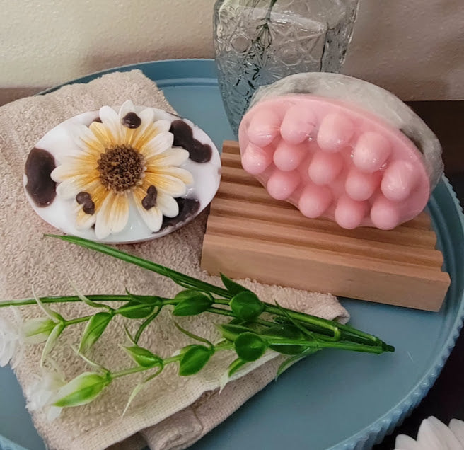 THE PASTURE&nbsp;MASSAGE BAR SOAP

4.5oz~127.5 grams

Sunflower fragrance is light and fresh with a hint of sunflowers.

Infused with Good old-fashioned fun &amp; good humor! 😊 These are sunflower and cow themed massage bar soap. Not only a cute and fun decoration... it will definitely put a smile on your face in the shower.&nbsp;

Goat Milk Soap Base~Fragrance Oil, Jojoba Oil, Red Marrocan Clay, Black &amp; Red colorant.

*Warning~For external use only. For eye contact~ flush eyes with water for 15 minute