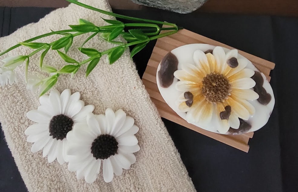 THE PASTURE&nbsp;MASSAGE BAR SOAP

4.5oz~127.5 grams

Sunflower fragrance is light and fresh with a hint of sunflowers.

Infused with Good old-fashioned fun &amp; good humor! 😊 These are sunflower and cow themed massage bar soap. Not only a cute and fun decoration... it will definitely put a smile on your face in the shower.&nbsp;

Goat Milk Soap Base~Fragrance Oil, Jojoba Oil, Red Marrocan Clay, Black &amp; Red colorant.

*Warning~For external use only. For eye contact~ flush eyes with water for 15 minute