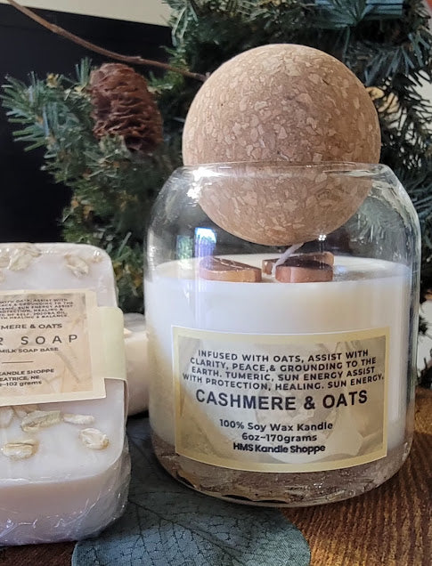 Cashmere and Oates Spiritual Kandle

6oz-170grams

100% Soy Wax Kandle&nbsp;

Fragrance is light and luxurious

Infused with oats, assist with clarity, peace &amp; grounding to the earth. turmeric, sun energy, assist with protection, healing. Sun Energy.

The dried herbs are uniquely placed in the bottom of the jar set in a clear bubbly gel wax. The cotton wick is intentionally placed on top of the gel wax so that all of the natural elements are kept below the flame and are not part of the burning kandle.

