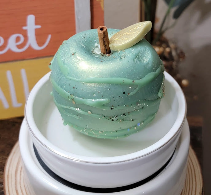 Fancy Granny Wax Melt

4oz-113grams

Green Apple-Toffee Fragrance

100% Soy Wax Melts

Fancy Granny Apple Wax Melt. Sparkling gold glitter will add a luxurious touch to all kinds of decor. Beautiful, colorful swirls of shimmery sparkles when melted. Package of one.&nbsp;

&nbsp;Intentions: apples, cinnamon-assist with clearing unwanted energy, bring in abundance, prosperity &amp; hidden wisdom. Good ole fashioned FUN!

*USE &amp; WARNING&nbsp;*

Place melt in Wax Warmer, Medium-High heat setting. Do not lea