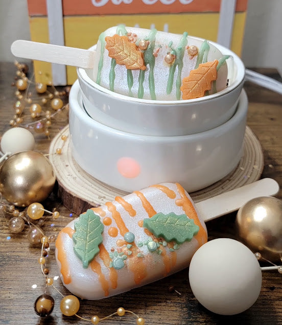 Fall Cake Pops- Wax Melts- spirituals

Package contains 2 cake pops.

3oz-85grams

Orange Pumpkin Buttercream Fragrance

Infused with Pumpkin Spice-Orange fragrance &amp; Salt. Assist in clearing energy, bringing in prosperity, protection &amp; sun energy.

&nbsp;*The cake pop can be cut into smaller pieces if you choose. Cake Pops can be cut with a warm knife. Or you can place entire cake pop in warmer dish. Stick can be removed once wax is melted or left in.. once wax hardens again stick can help to remov
